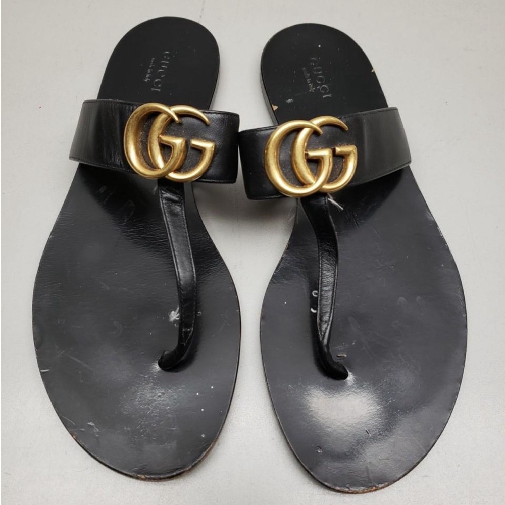 Gucci Black and Gold Sandals with Iconic GG Logo